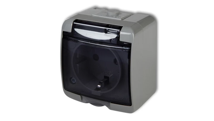 JUNIOR Gniazdo pojedyncze z/u SCHUKO (klapka dymna) popielaty 10GHE-1sd