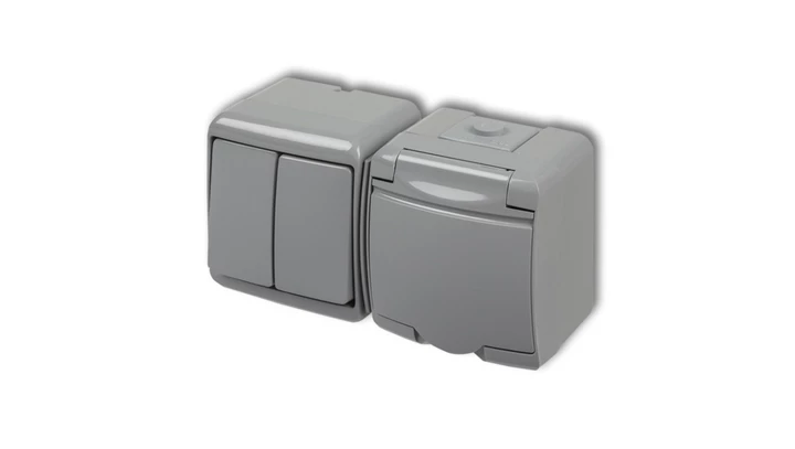 JUNIOR Łącznik świecznikowy + gniazdo hermetyczne (klapka popielata) popielaty 10WGHH-2