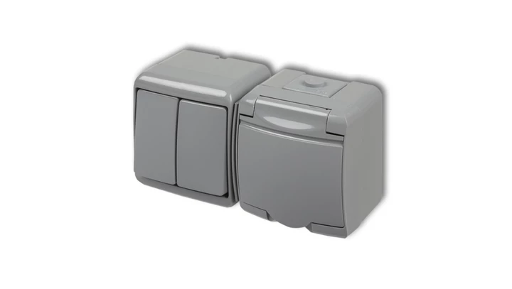 JUNIOR Łącznik świecznikowy + gniazdo hermetyczne (klapka popielata) popielaty 10WGHH-2p