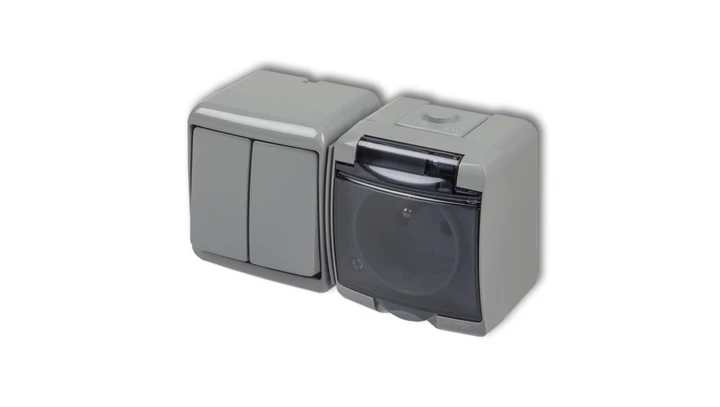 JUNIOR Łącznik świecznikowy + gniazdo hermetyczne (klapka dymna) popielaty 10WGHH-2d