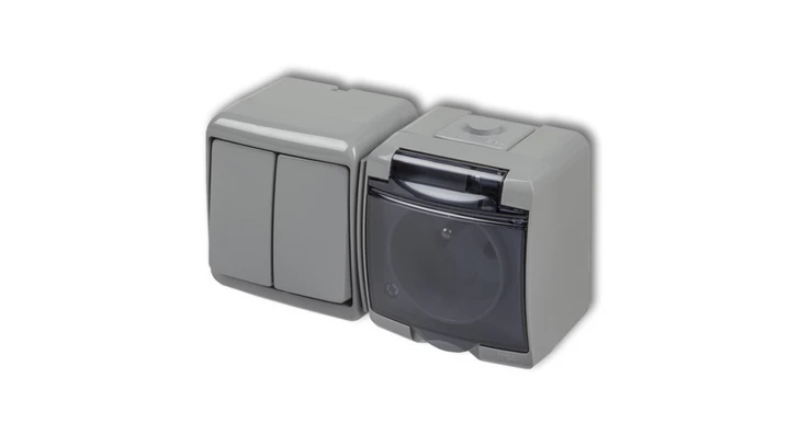 JUNIOR Łącznik świecznikowy + gniazdo hermetyczne (klapka dymna) popielaty 10WGHH-2dp