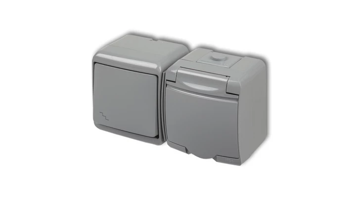 JUNIOR Łącznik schodowy + gniazdo hermetyczne (klapka popielata) popielaty 10WGHH-3